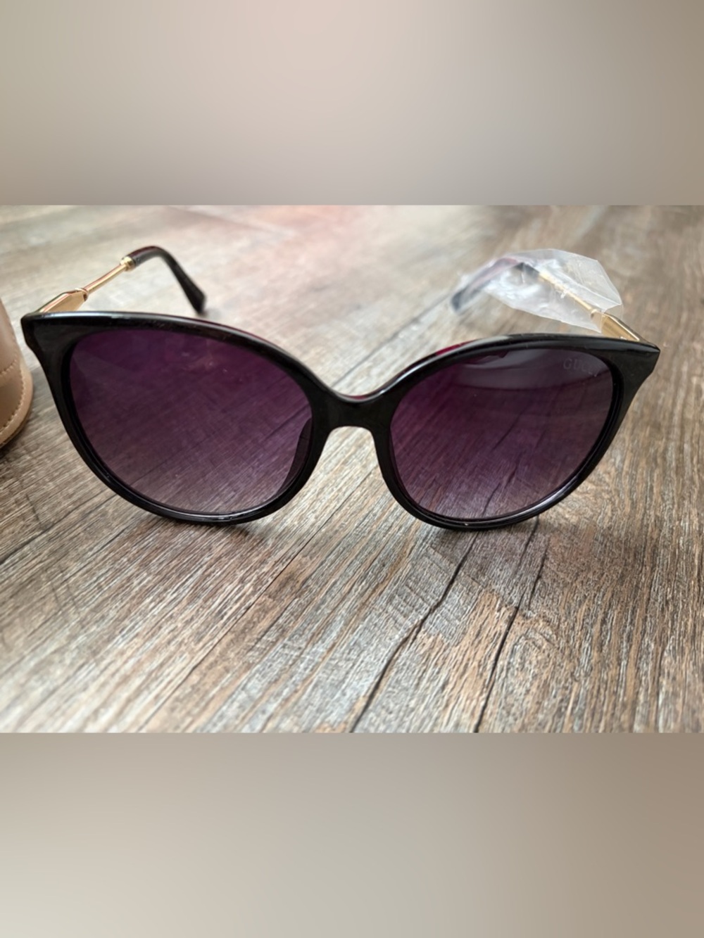 Gucci Black Cat-Eye Sunglasses with Purple Gradient Lenses